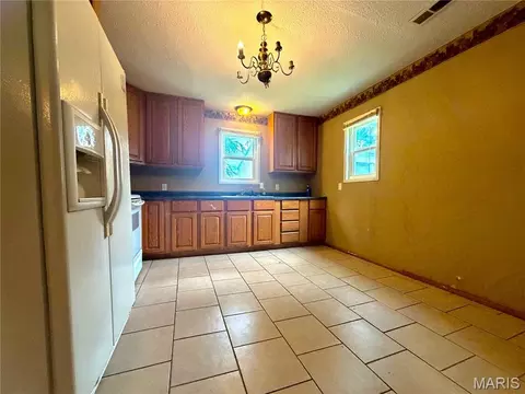 Kitchen - 511 Dixie St, Parma, MO 63870 photo 1 of 2