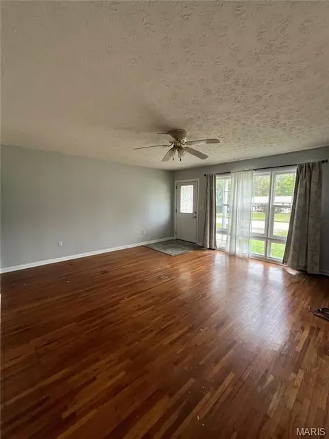 Living - 107 E 6th St, Dixon, MO 65459 photo 2 of 2