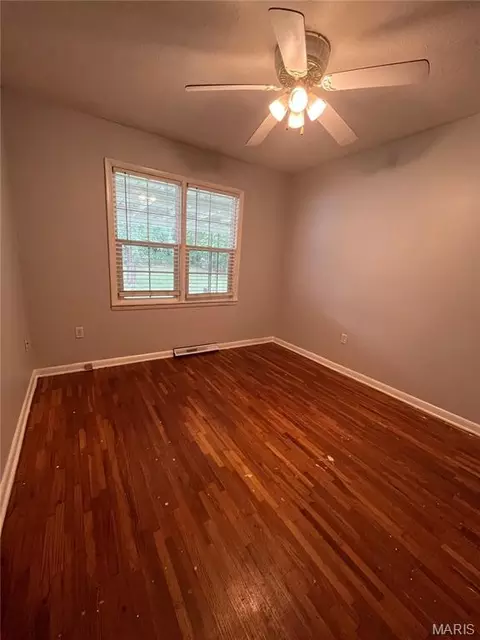Bedroom - 107 E 6th St, Dixon, MO 65459 photo 2 of 4