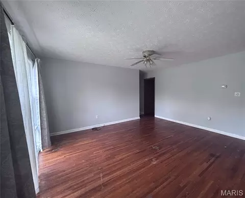 Living - 107 E 6th St, Dixon, MO 65459 photo 1 of 2
