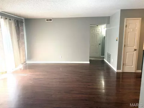 Living - 9209 Bent Pine Ct #F, Sappington, MO 63126 photo 6 of 7