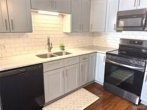 Kitchen - 9209 Bent Pine Ct #F, Sappington, MO 63126 photo 3 of 6