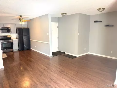 Living - 9209 Bent Pine Ct #F, Sappington, MO 63126 photo 1 of 7