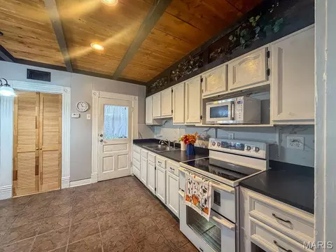 Kitchen - 202 E 2nd St, De Soto, MO 63020 photo 1 of 2