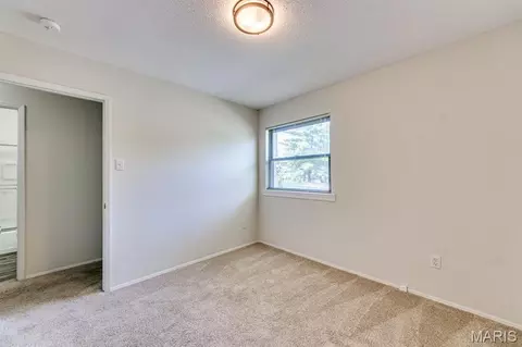 Bedroom - 230 Braeshire Dr #E, Ballwin, MO 63021 photo 10 of 12