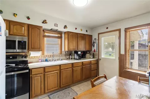 Kitchen - 210 E 3rd St, De Soto, MO 63020 photo 2 of 2