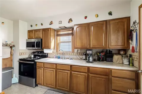 Kitchen - 210 E 3rd St, De Soto, MO 63020 photo 1 of 2