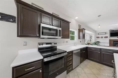 Kitchen - 130 Mccluer Dr, O'fallon, MO 63368 photo 2 of 2