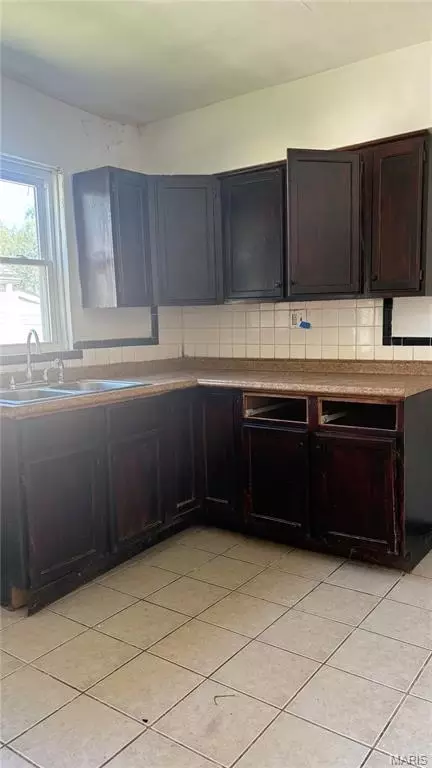 Kitchen - 6140 Payne Ave, Ferguson, MO 63135 photo 1 of 2