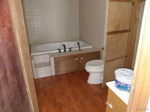 Bath - 407 E Hickory St, Nevada, MO 64772 photo 2 of 2