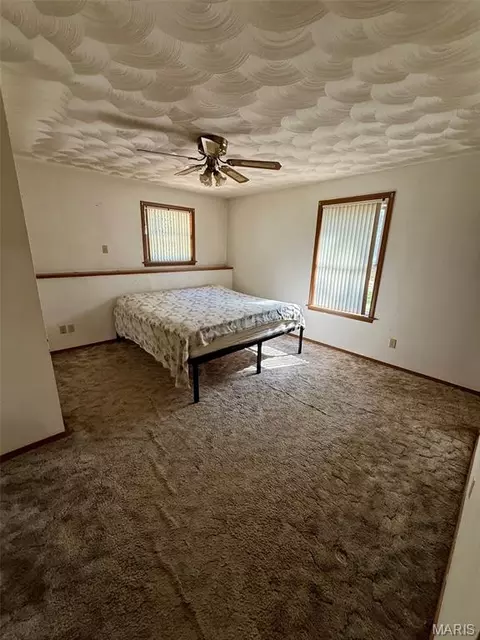 Bedroom - 8575 N Service Rd, Bourbon, MO 65441 photo 1 of 2