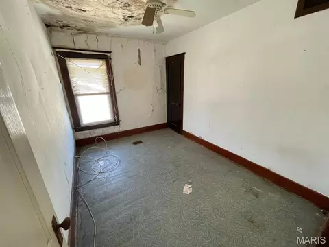 Bedroom - 148 W 2nd St, Roxana, IL 62084 photo 2 of 6