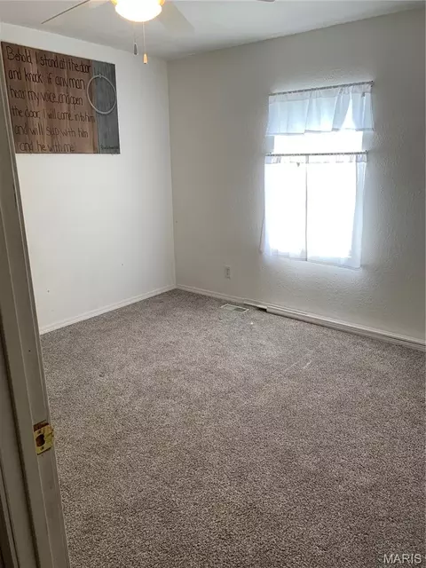 Bedroom - 311 W Main St, Parma, MO 63870 photo 2 of 3