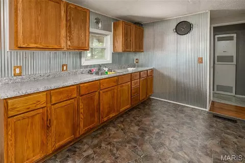 Kitchen - 203 E 3rd St, Christopher, IL 62822 photo 2 of 3