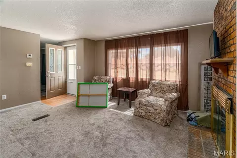 Living - 203 E 3rd St, Christopher, IL 62822 photo 1 of 2