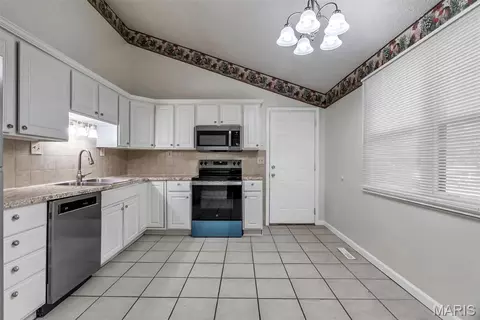 Kitchen - 409 E 11th St E, Washington, MO 63090 photo 1 of 4