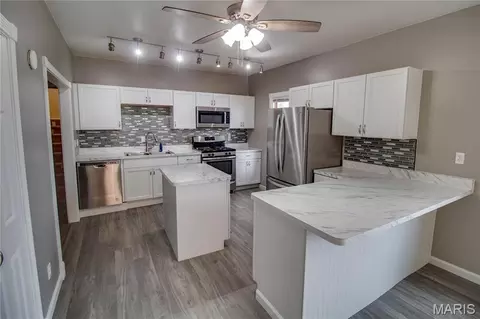 Kitchen - 409 E Teak St, Thayer, IL 62689 photo 1 of 3