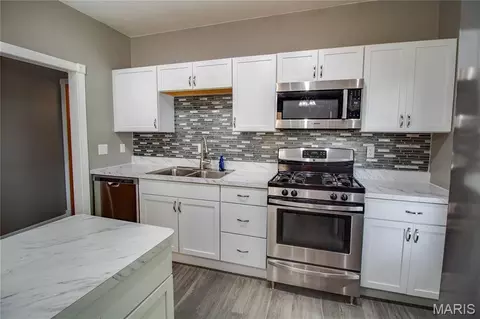 Kitchen - 409 E Teak St, Thayer, IL 62689 photo 3 of 3