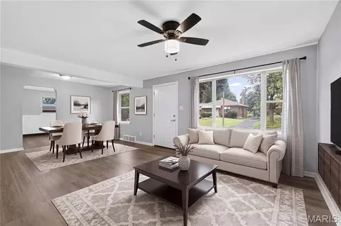 Living - 9016 Bessemer Ave, Berkeley, MO 63134 photo 2 of 3