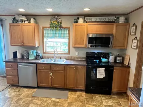 Kitchen - 216 Washington St, Eolia, MO 63344 photo 1 of 3