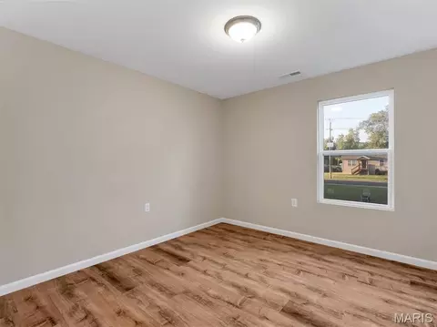 Bedroom - 609 S 2nd St, Pacific, MO 63069 photo 5 of 6