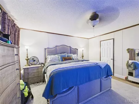Bedroom - 100 E Highway 62, Risco, MO 63874 photo 2 of 3