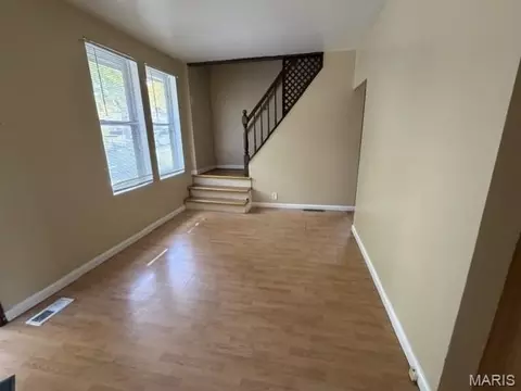 Living - 409 Abston Ave, Ferguson, MO 63135 photo 1 of 2