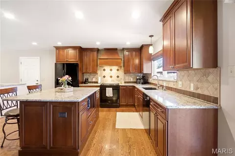 Kitchen - 733 Cedar Glen Dr, Weldon Spring, MO 63304 photo 2 of 5