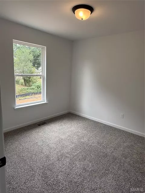 Bedroom - 209 John St, Troy, MO 63379 photo 1 of 7