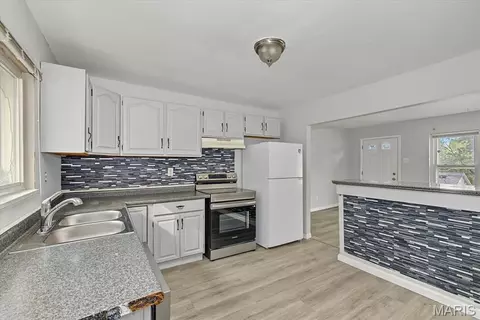 Kitchen - 220 Ruggles Rd, Ferguson, MO 63135 photo 3 of 4