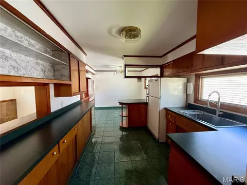 Kitchen - 201 N Cherry St, Mount Olive, IL 62069 photo 2 of 2