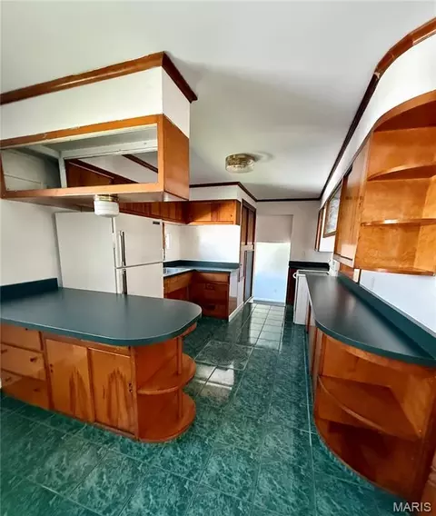Kitchen - 201 N Cherry St, Mount Olive, IL 62069 photo 1 of 2