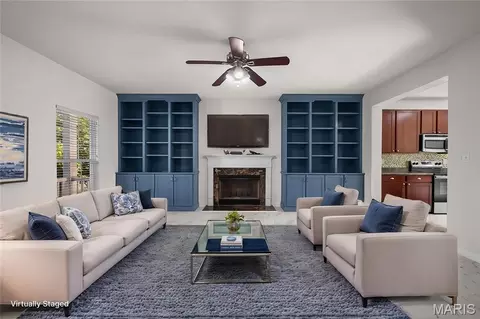 Living - 1321 Commons Cir, Cottleville, MO 63304 photo 2 of 5