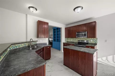 Kitchen - 1321 Commons Cir, Cottleville, MO 63304 photo 3 of 4