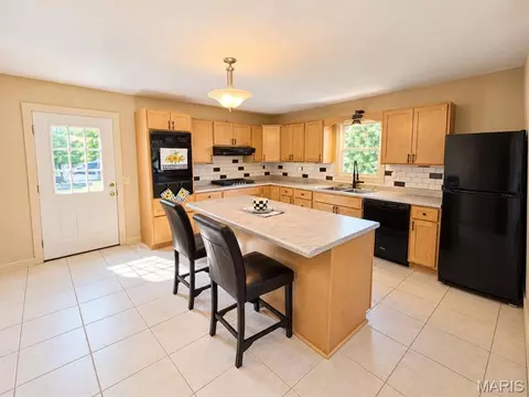Kitchen - 404 W Olive St, Palmyra, MO 63461 photo 1 of 5