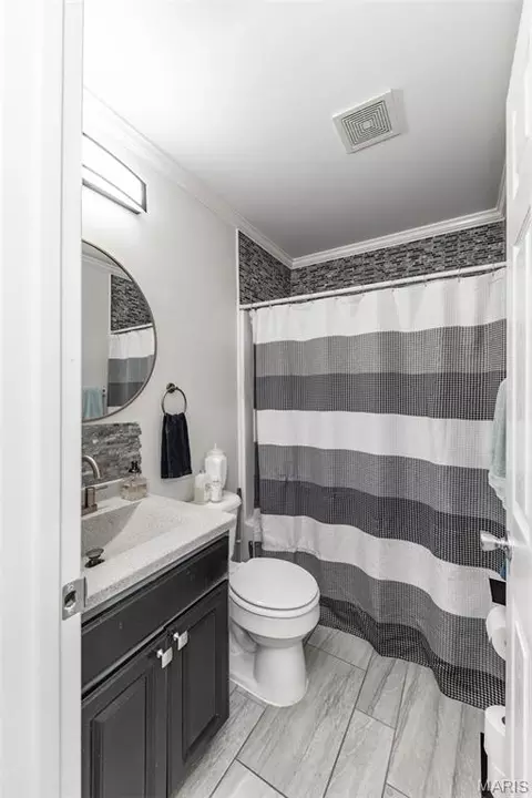 Bath - 513 S 1st St, Pacific, MO 63069 photo 2 of 2