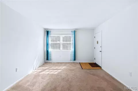 Living - 3129 Roger Williams Dr #D, Bridgeton, MO 63044 photo 3 of 4