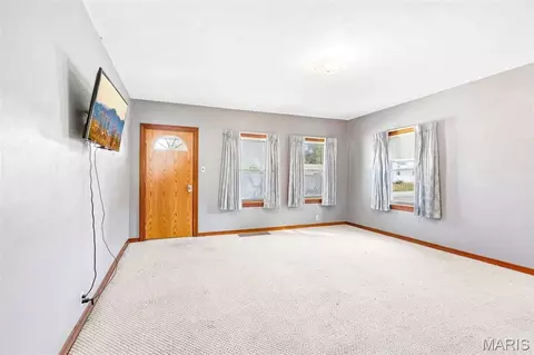 Living - 108 E 2nd South St, Mount Olive, IL 62069 photo 1 of 5