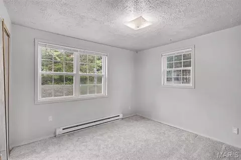 Bedroom - 7411 Summit Dr, Cedar Hill, MO 63016 photo 2 of 3
