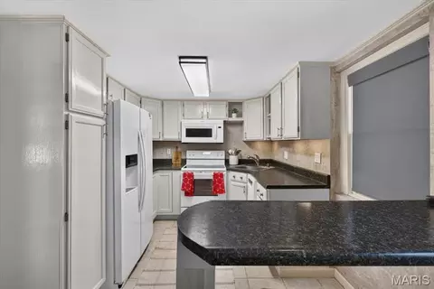 Kitchen - 612 E 4th St, Alton, IL 62002 photo 1 of 2