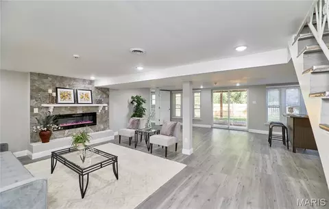 Living - 7707 Springdale Dr, Normandy, MO 63121 photo 6 of 15
