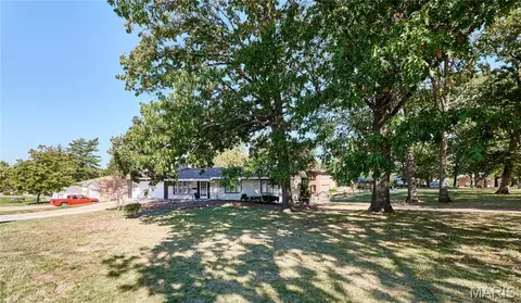 Exterior - 7707 Springdale Dr, Normandy, MO 63121 photo 3 of 10