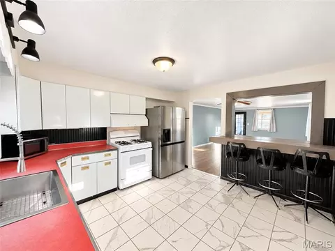 Kitchen - 315 E Washington St, Cuba, MO 65453 photo 1 of 4