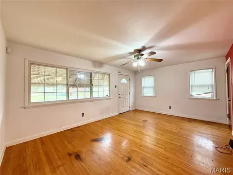 Living - 408 Warfield Ave, Ferguson, MO 63135 photo 1 of 4