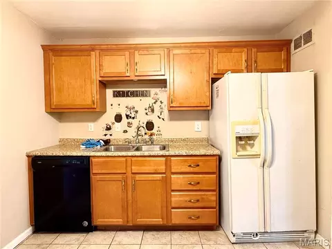 Kitchen - 408 Warfield Ave, Ferguson, MO 63135 photo 3 of 6