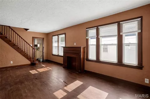 Living - 300 S Clark Ave, Ferguson, MO 63135 photo 1 of 1