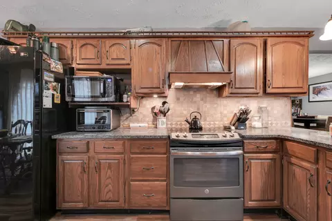 Kitchen - 1302 S 14th Ave, Ozark, MO 65721 photo 4 of 6