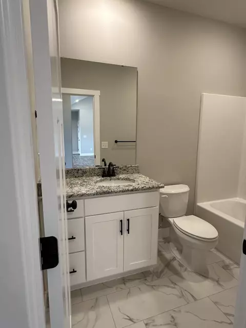 Bath - 1105 S Swift Ave, Ozark, MO 65721 photo 3 of 6