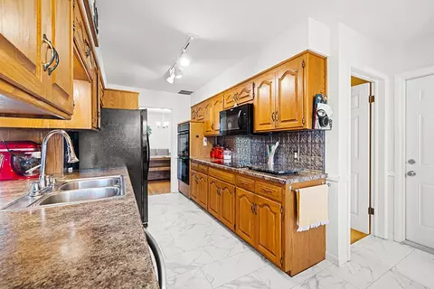 Kitchen - 2165 E Langston St, Springfield, MO 65804 photo 2 of 9