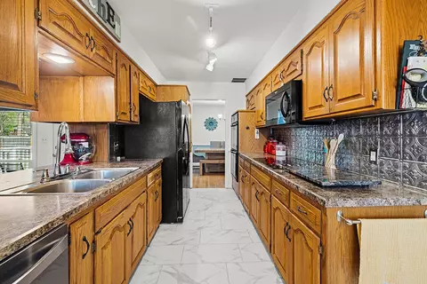 Kitchen - 2165 E Langston St, Springfield, MO 65804 photo 7 of 9